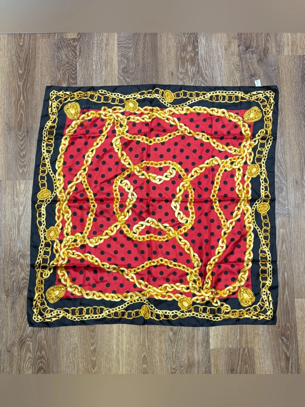 Echo Red & Black Polka Dot Scarf with Gold Chain Motif